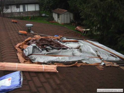 Before - Roof poorly tarped