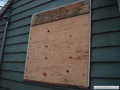 Exterior After - Notice the small strip of plywood spliced to the large piece