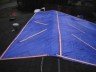 After - Tarp must extend over the ridge